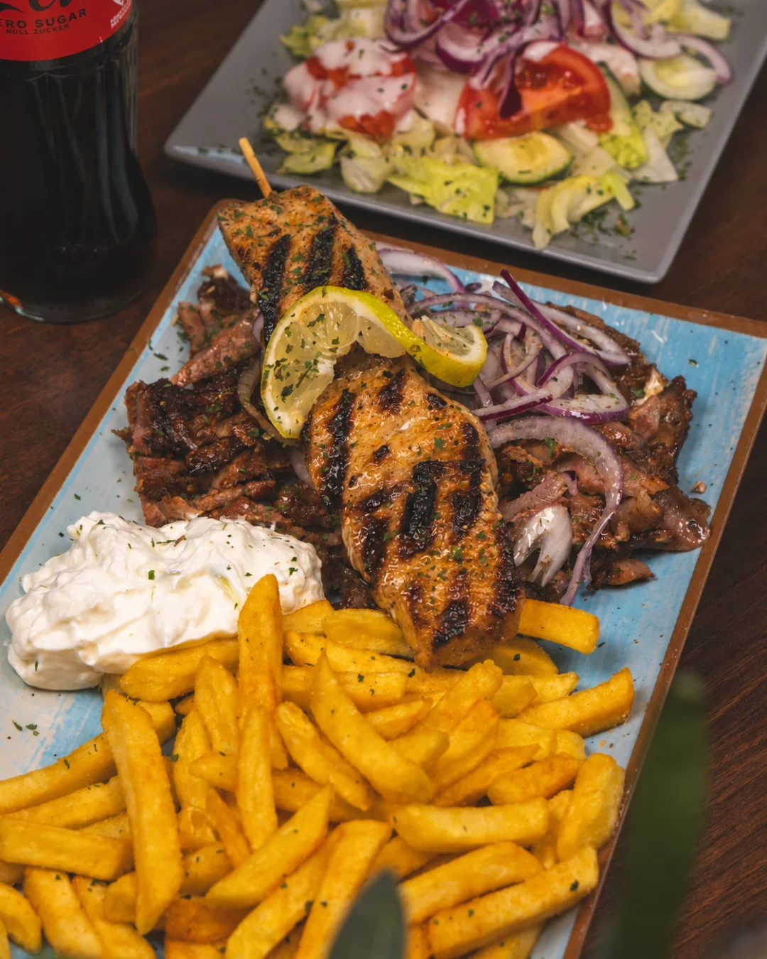 Gyros and grilled meat with fries and tzatziki at Zaki’s